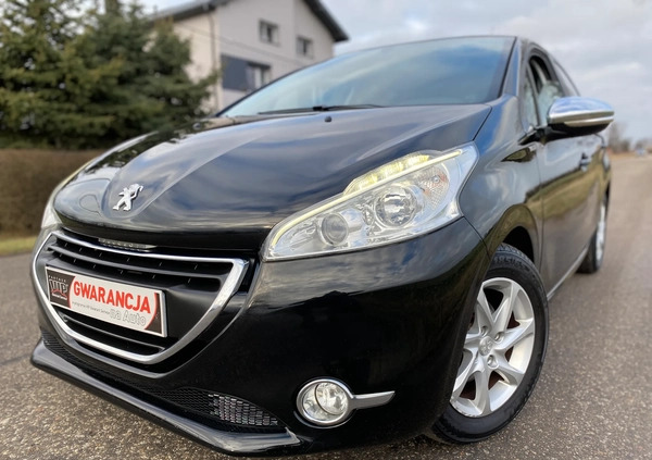 Peugeot 208 cena 26890 przebieg: 148463, rok produkcji 2014 z Strzyżów małe 781